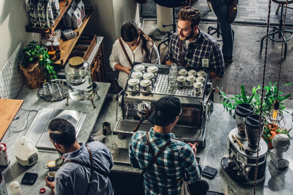 Thriving cafe owners understanding restaurant equipment costs