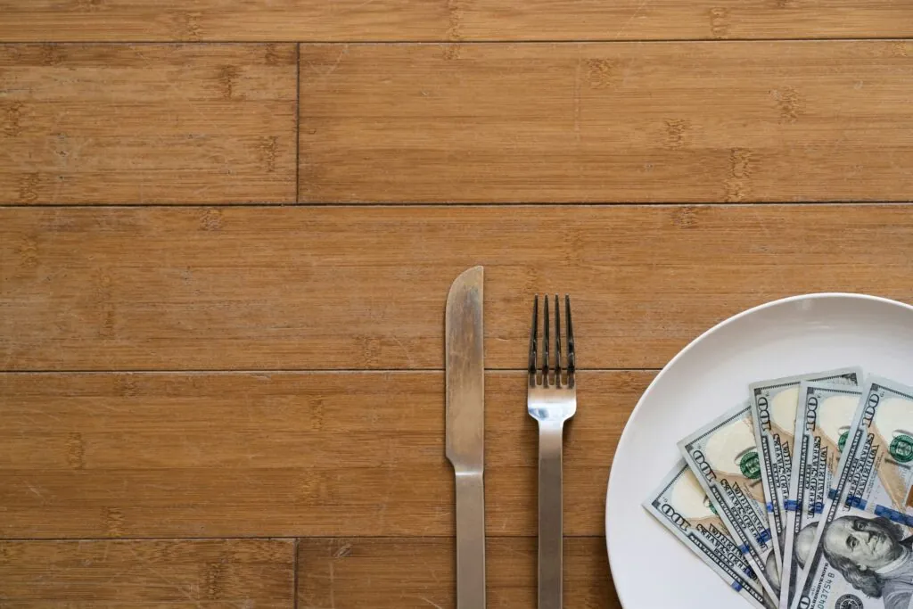 Restaurant plate with cash