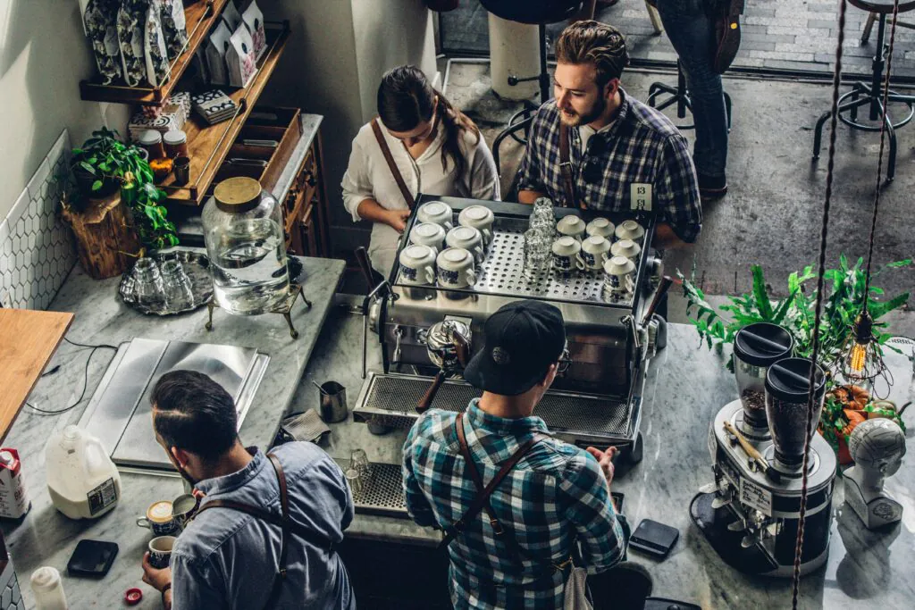 Thriving cafe owners understanding restaurant equipment costs
